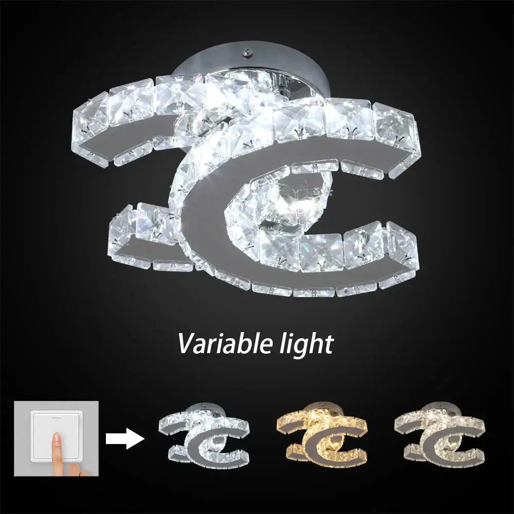 Modern crystal led ceiling lamp with a sleek metallic frame and clear crystal facets in interlocking c design for living room decorbites crystal led