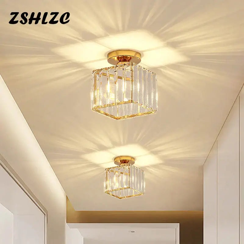 Gold-finished crystal led ceiling light with geometric faceted clear glass panels modern decorbites crystal led design