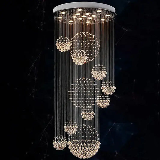 A modern crystal led chandelier with a white circular top and cascading clear crystal strands for villa kitchen decorbites crystal led