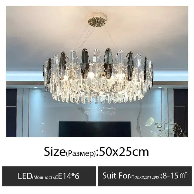 A modern crystal led chandelier with clear and dark glass prisms and six led bulbs for dining room decor by Decorbites