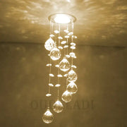 A modern crystal led downlight ceiling lamp with cascading teardrop glass pendants for living room decorbites crystal led