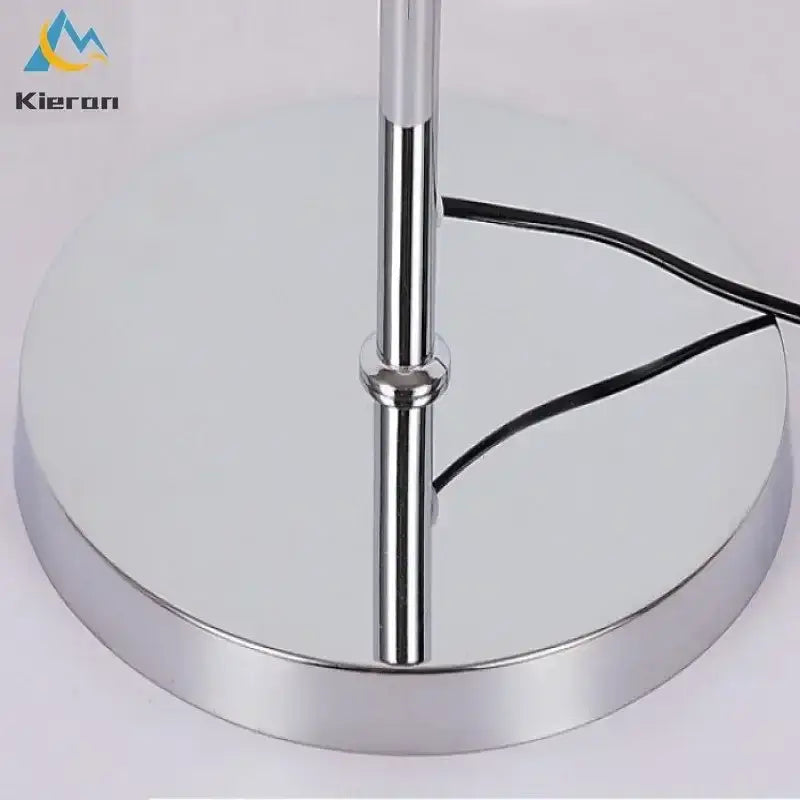 Modern crystal led feather floor lamp with chrome finished base and polished metal stem for stylish living room decorbites crystal led