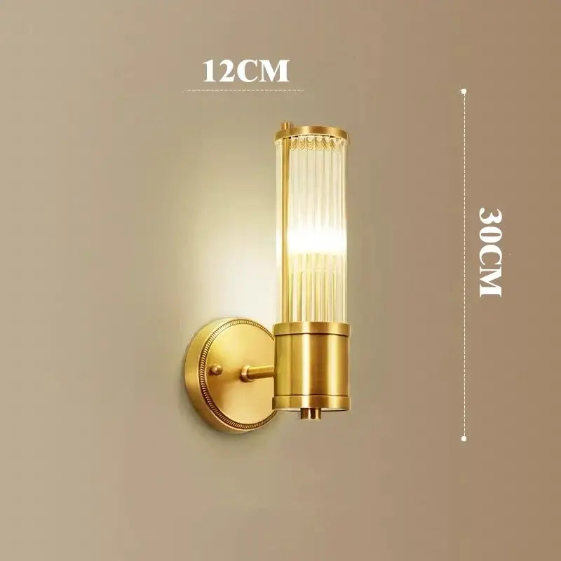Modern crystal led gold wall sconce with a gold-toned cylindrical glass shade and brushed brass finish for stylish decorbites crystal led lighting