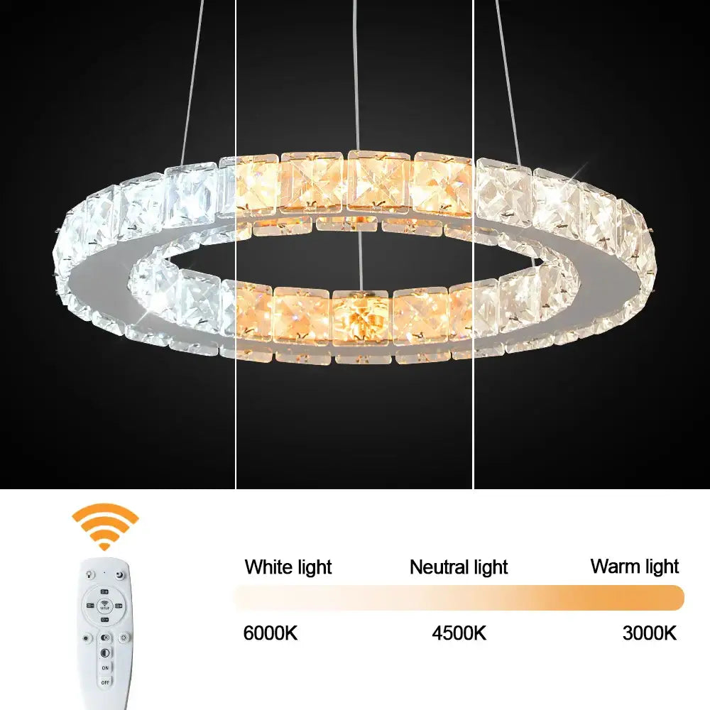 Modern crystal led pendant chandelier in white with adjustable led lighting in neutral and warm tones for dining room decorbites crystal led