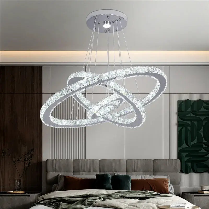 Modern crystal led pendant double ring chandelier with interlocking crystal rings and sleek chrome ceiling mount for dining room decorbites crystal led