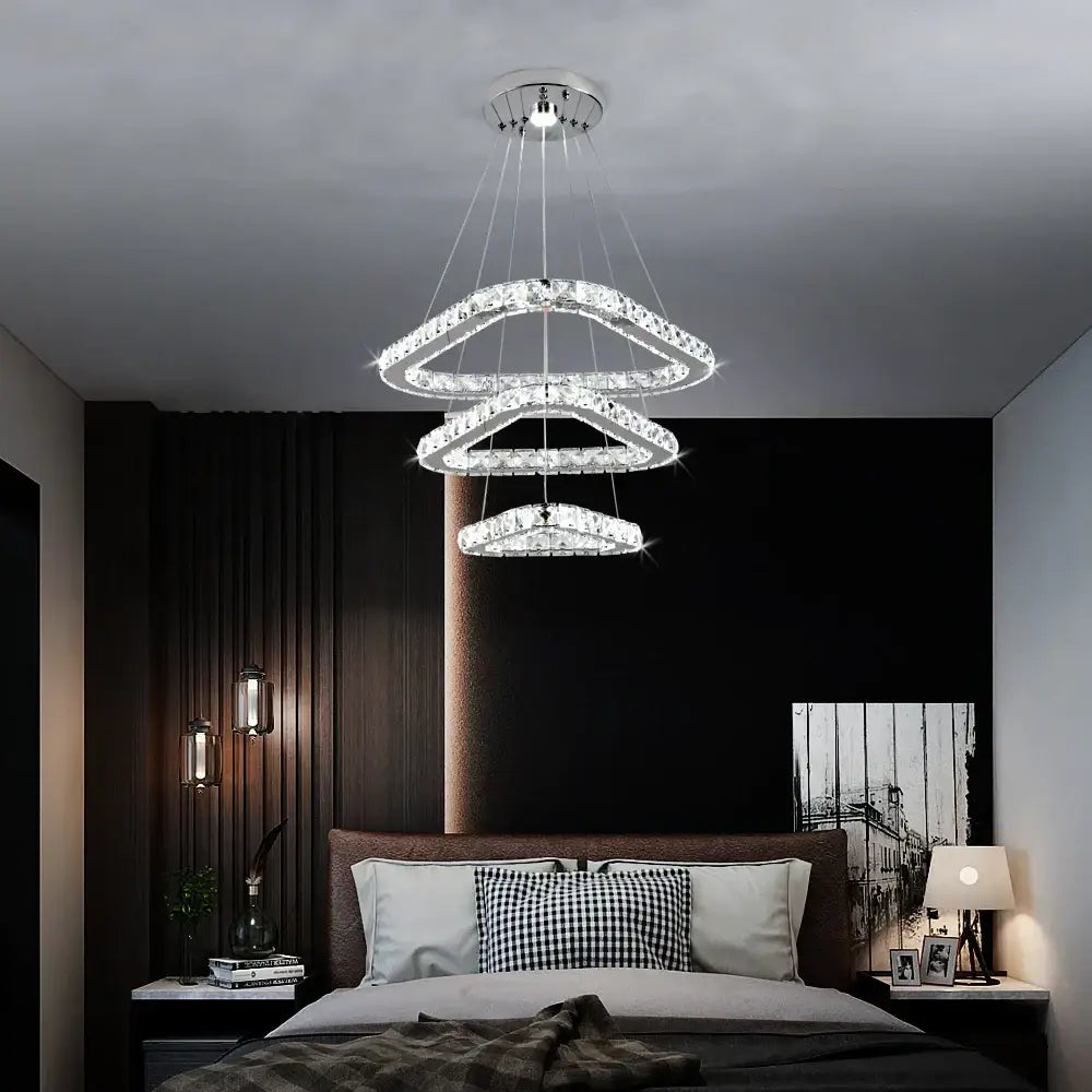 A modern multi-tiered crystal led pendant with sleek chrome finish for dining room decorbites crystal led chandelier