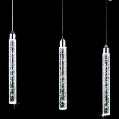 Three sleek crystal led pendant lights with chrome accents hang against black background modern decorbites crystal led