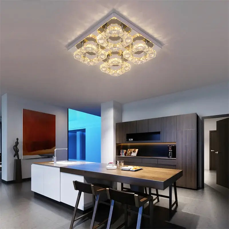 Modern crystal led square chandelier with multiple crystal rings and gold-toned decorbites crystal led accents chrome light