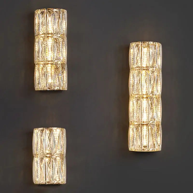 Three elegant modern decorbites crystal led wall lamps with warm golden lighting and textured glass for living room decor