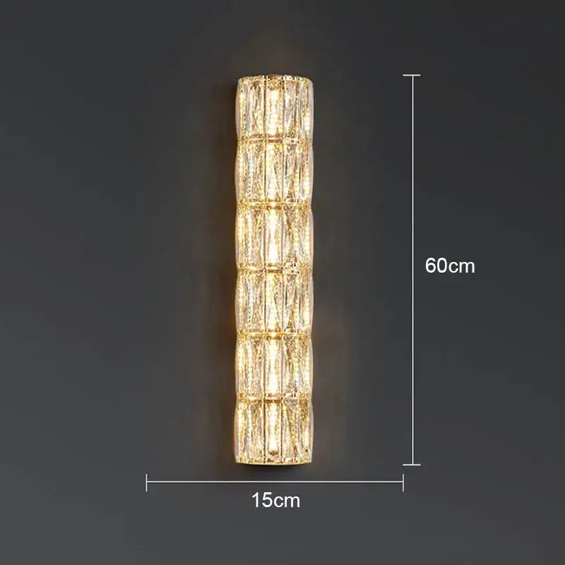 Modern crystal led wall lamp with stacked rectangular crystal segments emitting warm golden glow for living room decorbites crystal led wall