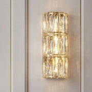 Modern crystal led wall lamp with stacked faceted crystal segments and warm integrated led lighting for living room decorbites crystal led