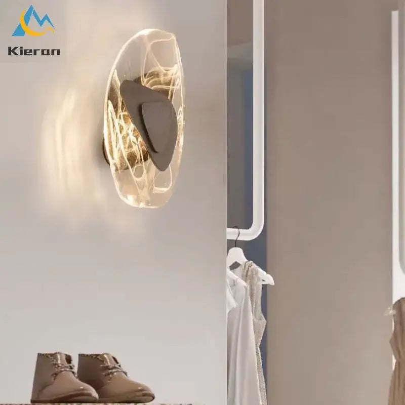 Modern crystal led wall lamp featuring a translucent sculpted glass body with dark gray metallic bronze accent decorbites crystal led