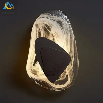 Modern crystal led wall lamp with translucent swirling glass body, sleek black triangular shade, and bronze accents for living room decorbites crystal led