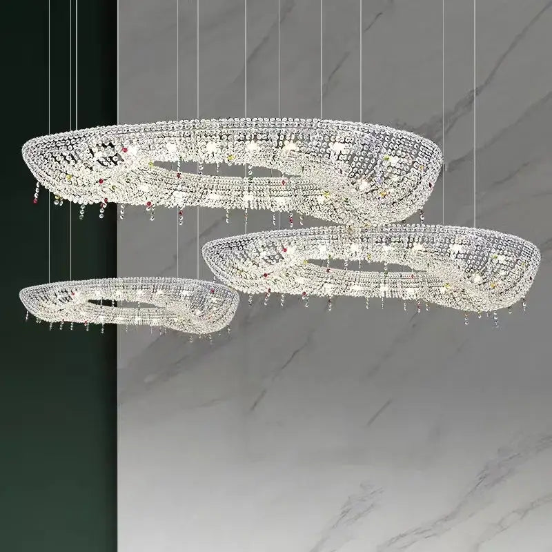 Three-tiered decorbites crystal oval chandelier with clear and red gemstone accents for modern living room decor
