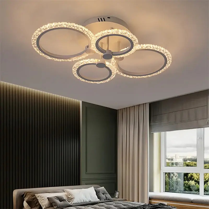 Modern crystal ring acrylic ceiling lights featuring a circular crystal-encrusted design with a sleek metallic base