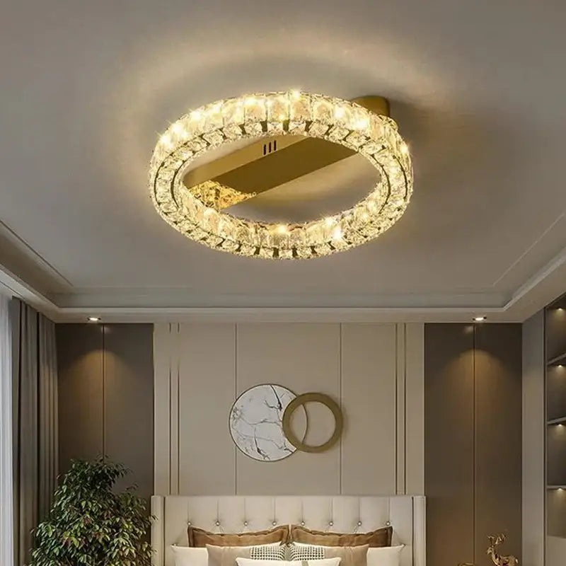 Modern gold-toned decorbites crystal ring ceiling light with embedded led bulbs for dimmable dining room decor