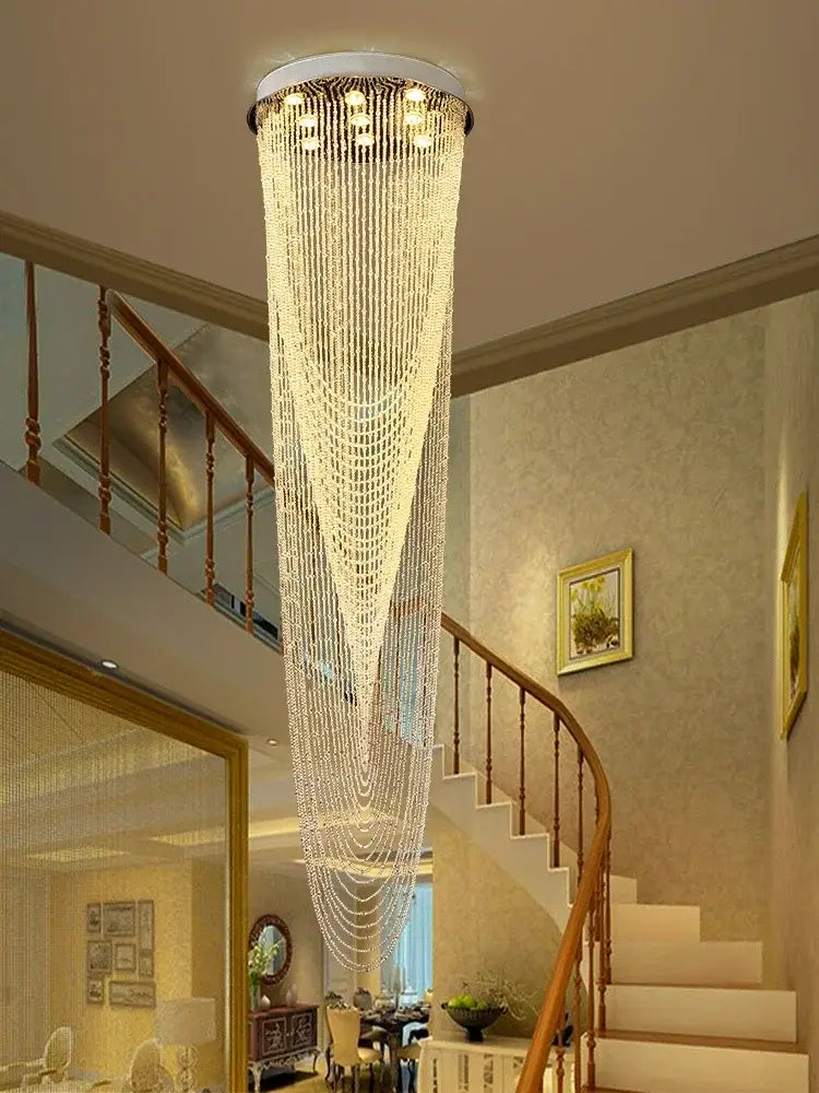 Modern crystal rotating chandelier with cascading clear faceted crystals for elegant living room decorbites crystal rotating