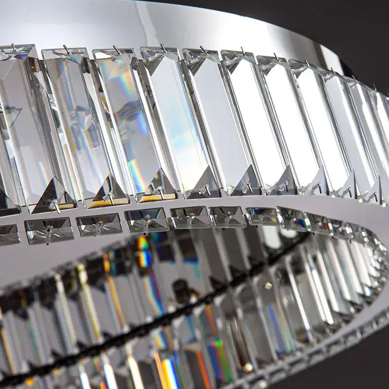 Modern crystal round ceiling lamp with sleek chrome frame and faceted prisms for vibrant living room decorbites lighting