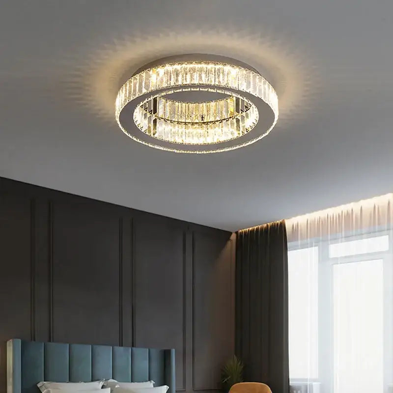 Modern crystal round ceiling lamp with two concentric rings of clear faceted crystals in a metallic frame ceiling lamp decorbites crystal round