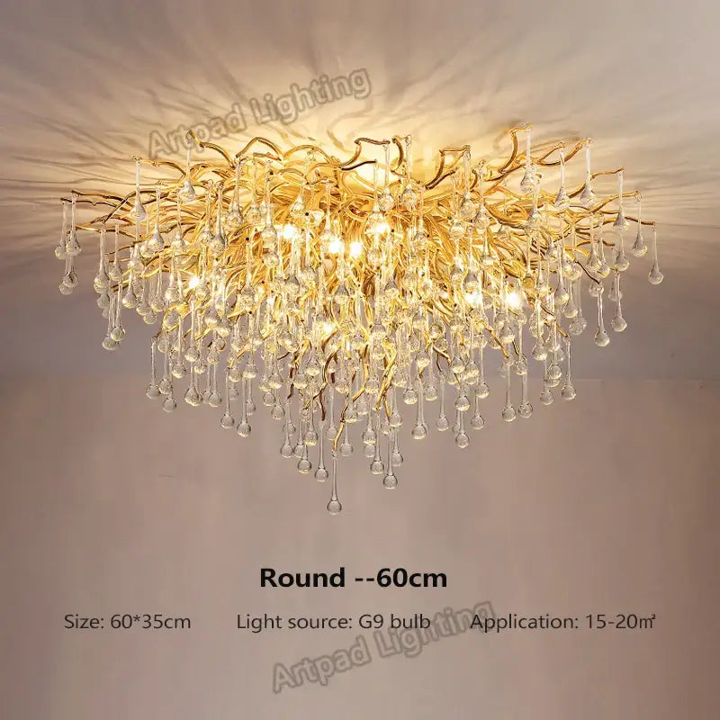 Modern crystal teardrop gold chandelier with intricate branching arms and dangling crystal teardrop pendants for elegant decorbites teardrop gold ceiling decor