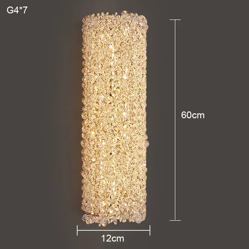 Modern crystal wall lamp with slender gold rectangular sconce featuring clear and golden-toned decorbites crystal beads