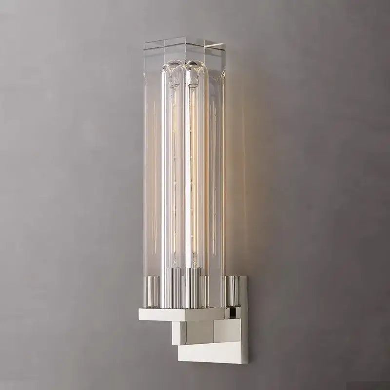 Modern crystal wall lamp with sleek chrome finish and clear glass tubes housing warm led bulbs for bedroom decorbites wall lamp