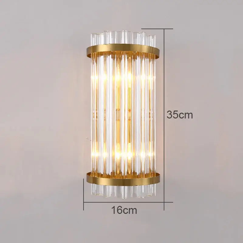Modern gold-toned wall lamp with vertical clear glass rods and cylindrical design for living room decorbites crystal wall