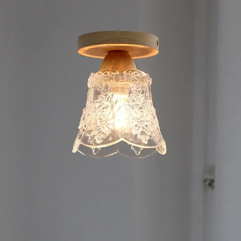 A warm-toned crystal wood led ceiling lamp with a clear etched glass floral shade from decorbites for bedroom decor