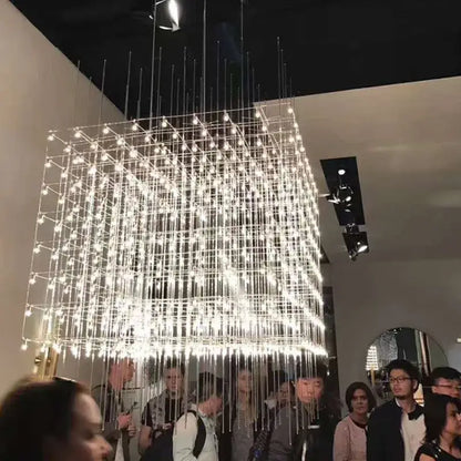 Modern cube led chandelier by decorbites with thin metallic wires and bright white leds for luxury dining room and office