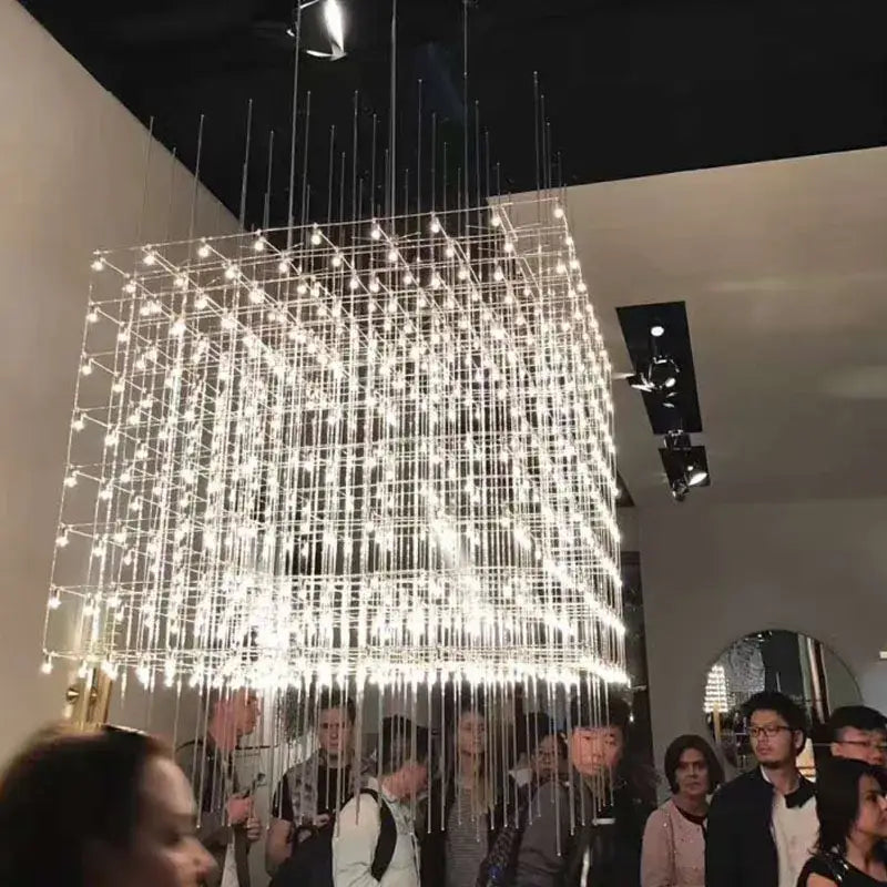 Modern cube led chandelier by decorbites with thin metallic wires and bright white leds for luxury dining room and office