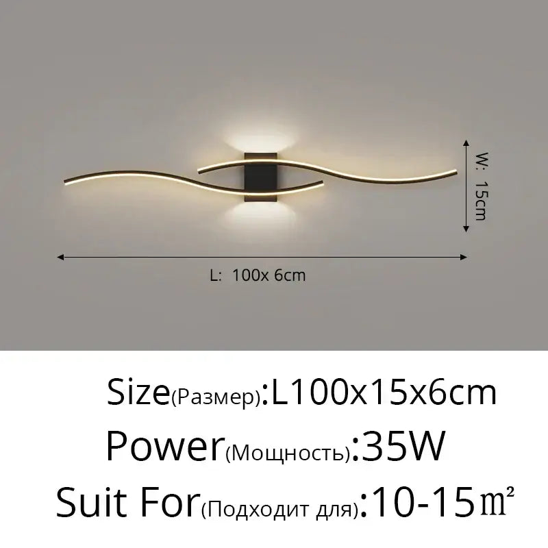 Modern curved gold led wall lamp with sleek curved metal arms and black rectangular housing for bedroom lighting decorbites led wall