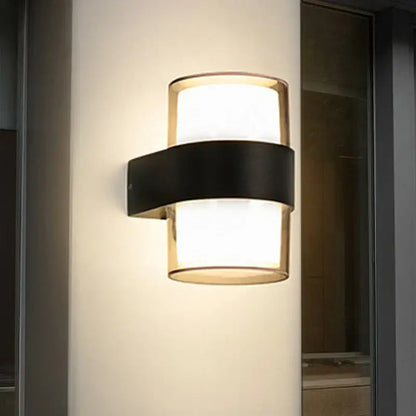 Modern cylindrical black led wall light with gold accents and frosted glass diffuser for elegant decorbites led wall use
