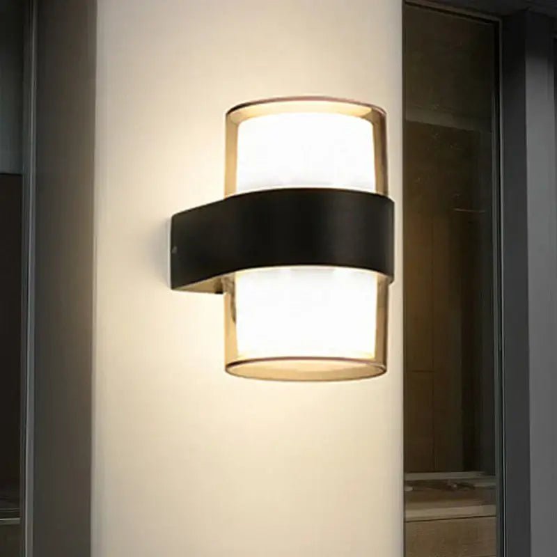 Modern cylindrical black led wall light with gold accents and frosted glass diffuser for elegant decorbites led wall use