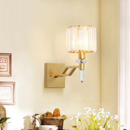 DecorBites™ DecorBites™ Modern Cylindrical Clear Crystal Wall Sconce with Curved Arm and Black/Gold Finish