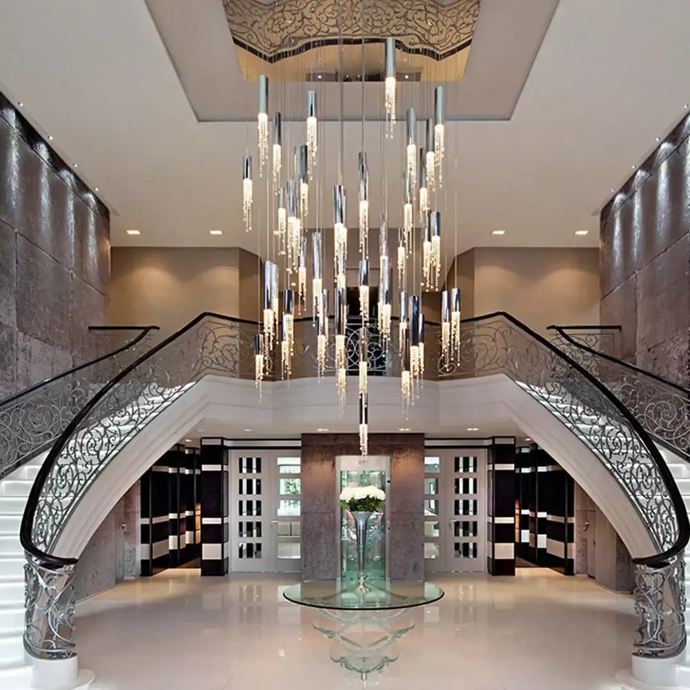 A modern cylindrical crystal staircase chandelier with chrome and crystal elements for living room decorbites crystal staircase