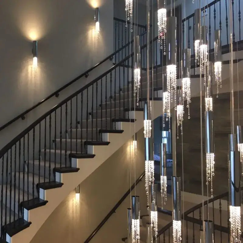 Modern cylindrical crystal staircase chandelier with cascading crystal beads and chrome finish for living room decorbites crystal staircase