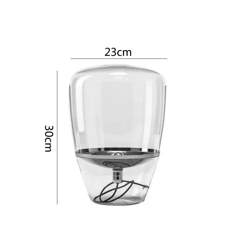 Modern cylindrical decorbites glass table lamp with clear glass and metallic base for bedroom led lighting