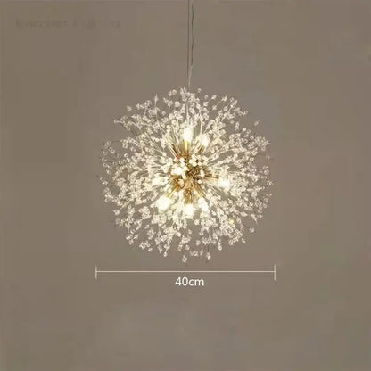 A modern decorbites dandelion crystal chandelier with gold-toned metal and clear crystals for living room decor
