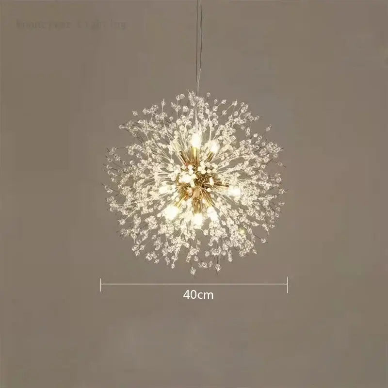 A modern decorbites dandelion crystal chandelier with gold-toned metal and clear crystals for living room decor