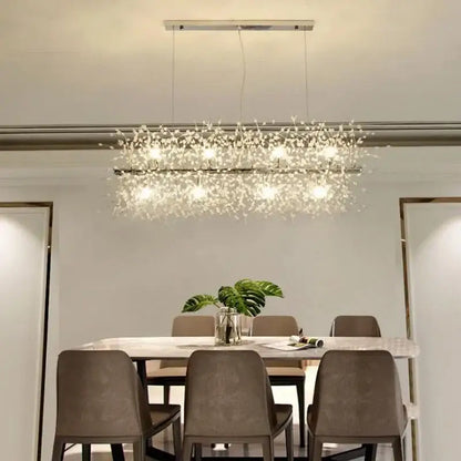 A modern dandelion led crystal chandelier with a sleek metallic frame and clear crystals for dining room decorbites