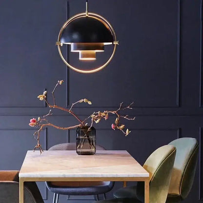 Modern Danish spherical black and gold pendant light with chrome accents for dining room cord pendant installation