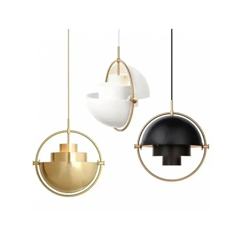Three modern pendant lights with spherical gold metal frames and white or black matte shades for contemporary interiors