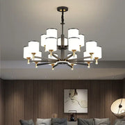 Modern dark bronze decorbites glass chandelier with multiple cylindrical white glass shades for living room light