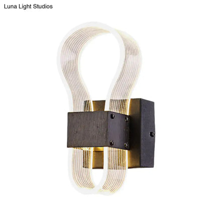 Modern dark bronze led wall lamp with ribbed glass tubes and white warm light for bedroom illumination