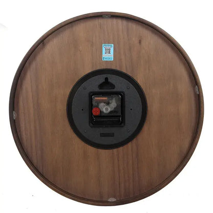 Modern dark brown bamboo wall clock with wood grain finish and black circular backing showing mechanical movement