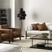 Modern dark brown spherical bubbleglass led floor lamp with slender black stand for living room decorbites floor lamp