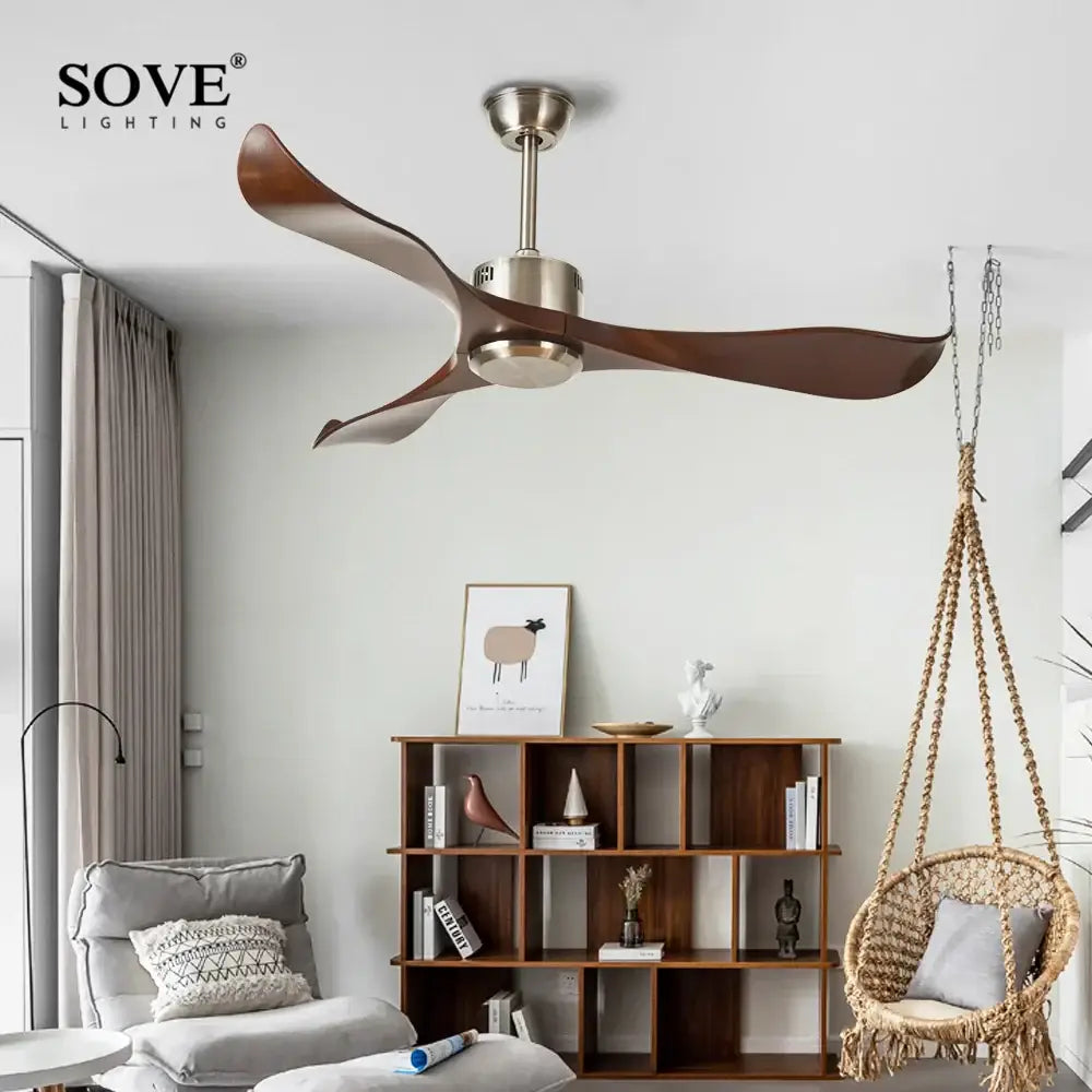 Modern dark brown ceiling fan with remote control featuring sleek bronze metal housing and three curved wooden blades