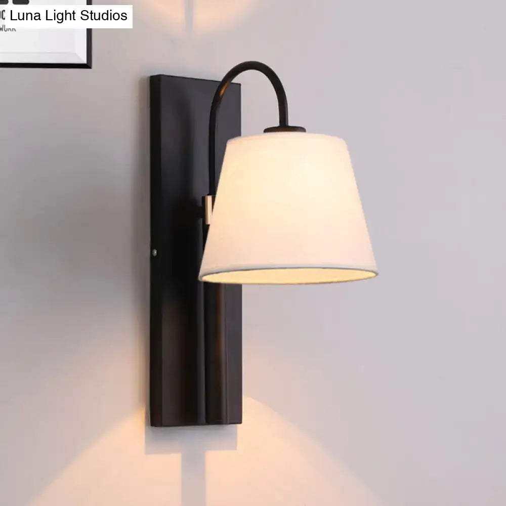 Black metal wall lamp with dark brown and gold conical fabric shade for living room sconce lighting