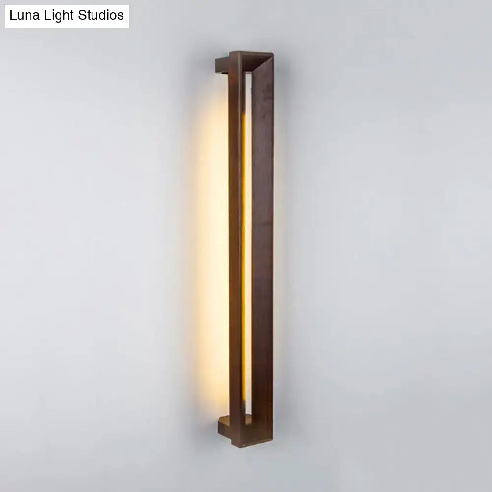 Modern dark brown wooden led wall sconce with bronze finish and sleek rectangular design for study room lighting