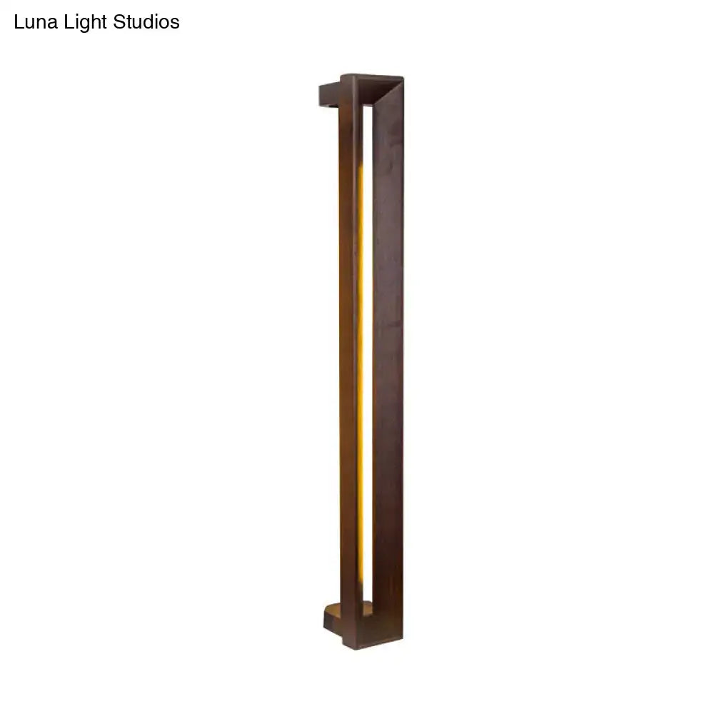 Modern dark brown wooden led wall sconce with a warm vertical led light strip for study room lighting